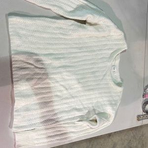 Small white crew neck sweater